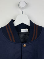 Estrella Damm College Bomber